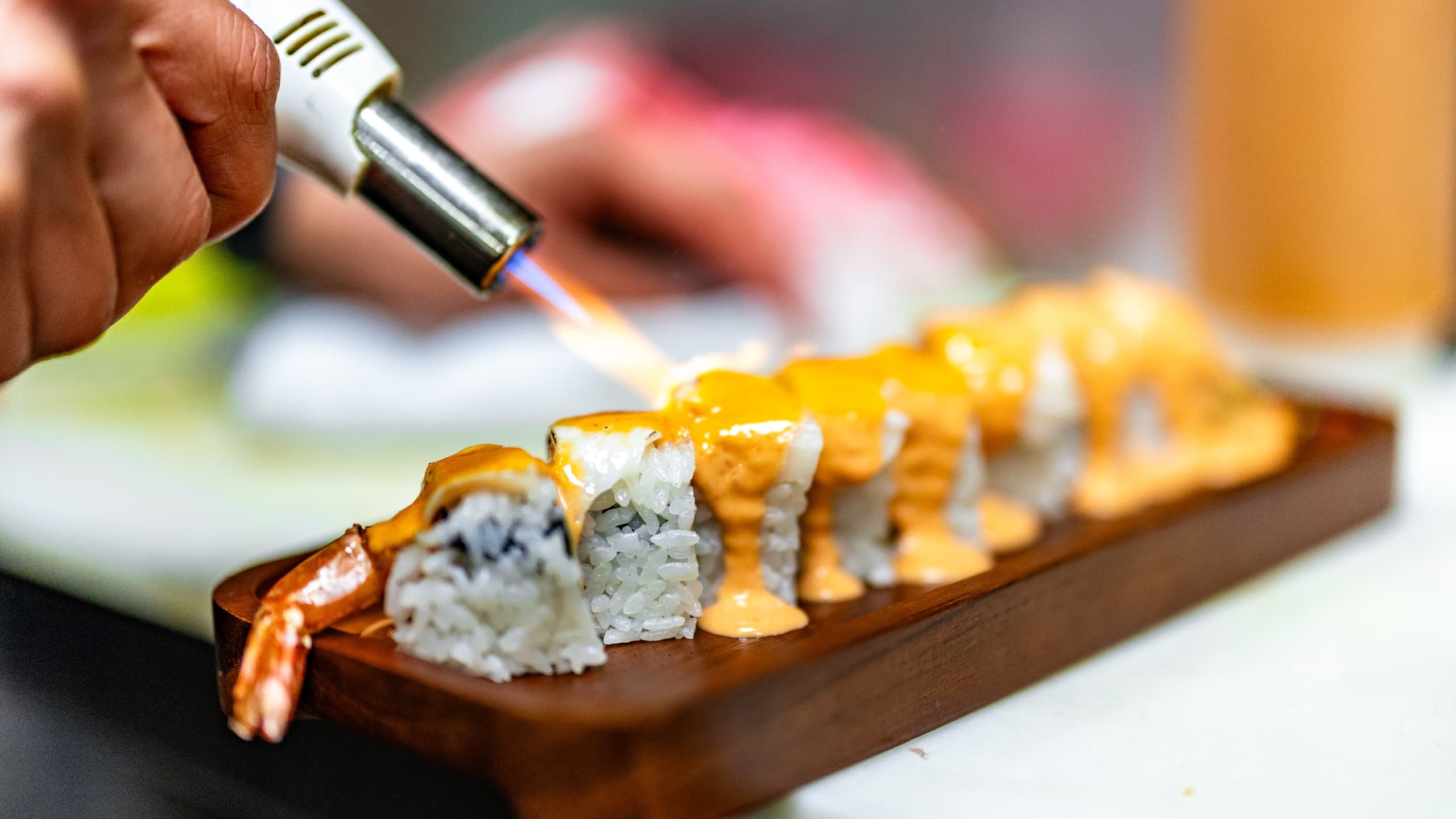 Ryuu Sushi dish flame preparation